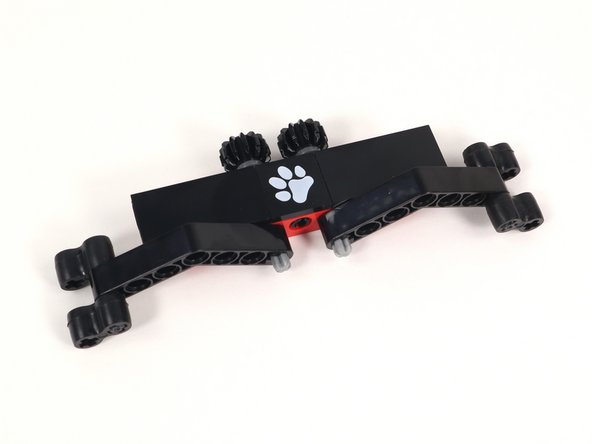 Connect the Claw arms to the axles on Section 3.