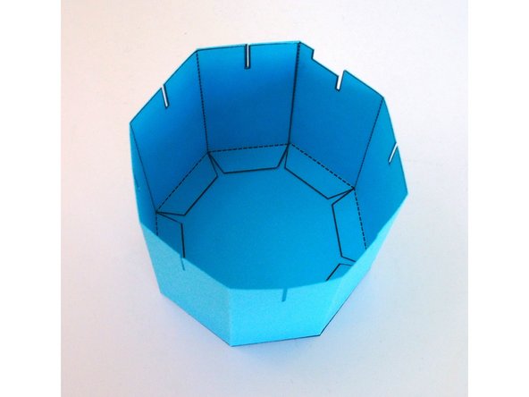 Tip: I found it easiest to flip the body upside down while I was gluing the tabs in place