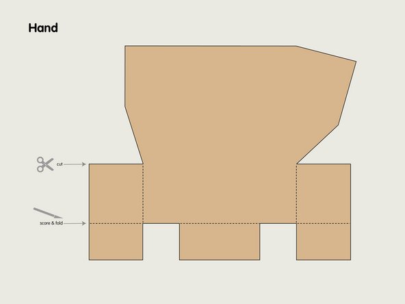 Print out the template and tape (or glue) it to corrugated cardboard.