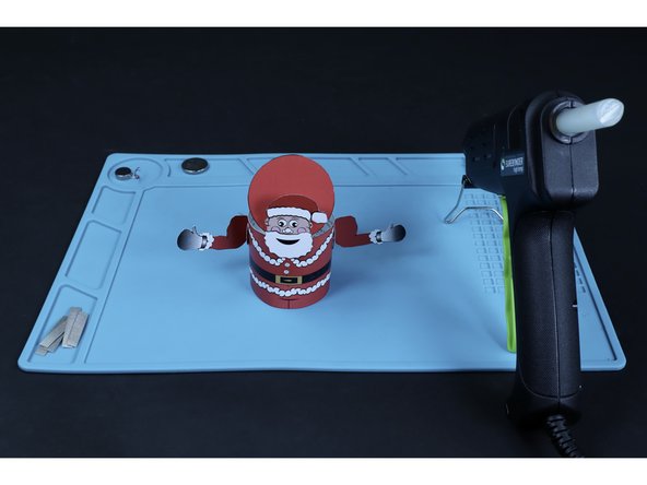 Do the same for each of Santa's arms (It may be helpful to fold the connector circles and line them up with the tube body first).