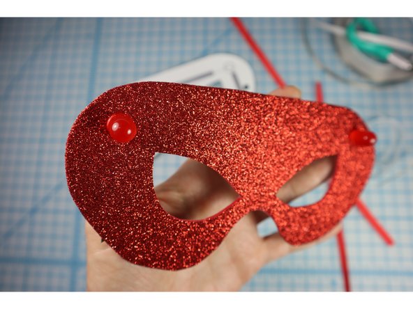 Insert the LEDs through the holes from the front side of the project.