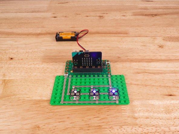 The NeoPixels need to be chained together. You'll notice the labels DI and DO on each one. These stand for Digital Input and Digital Output.
