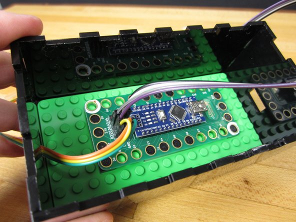 Put your LEGO base plate inside.