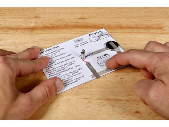 Test your circuit! When the switch lever is pressed into contact with path &quot;D.&quot; your motor should spin.