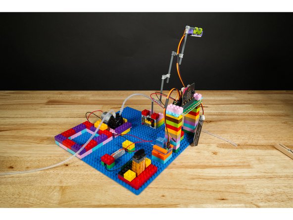 The Addressable RGB LED Strip is probably the trickiest part of this, so we used a bunch of random LEGO Technic axles we had lying around. (Parts list to come!)