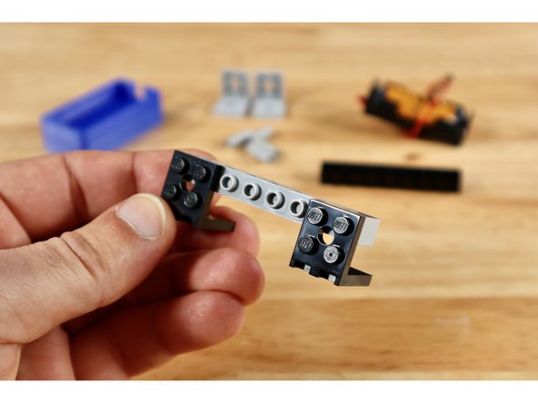 Note: This step relates to our brick-compatible 3D printed 2AAA Battery Pack Mount included in some kits. If you don't have one, you can either skip this assembly OR print your own using the linked file.