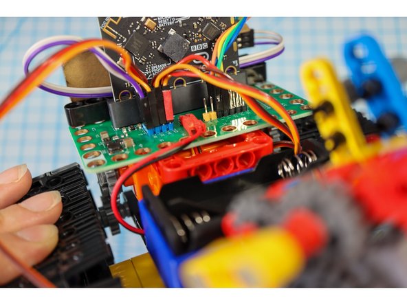 Connect the motor wires to Pin 15 as shown.