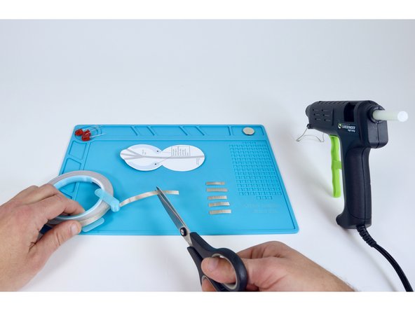 Measure and cut 6 pieces of Maker Tape that are about as long as your LED legs.
