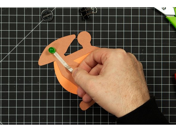 Run a piece of tape along the front of your Pterodactyl, covering the negative LED leg.