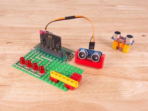 A few Technic pins, a Technic beam, and some LEGO bricks are all that is needed.
