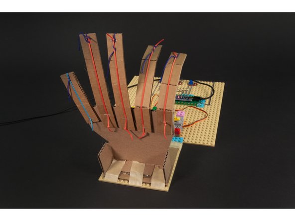 Congrats! You just built a cardboard hand and controlled it with a Robotics Board!