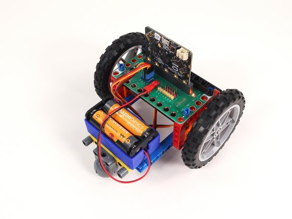 On the back of the Rover disconnect the battery pack and both servos from the Bit Board.