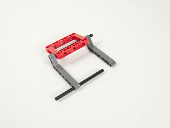 Try to center the axle and make sure the beams are not angled in or out - they should be facing straight out.