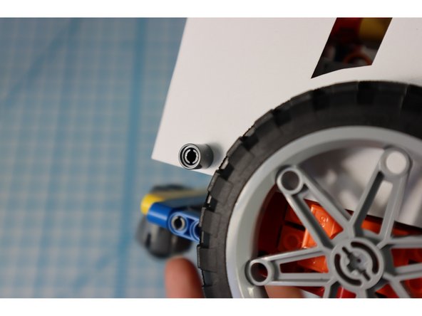 Turn on the bot and test that the arms are moving up and down as expected. Adjust the gears as needed.