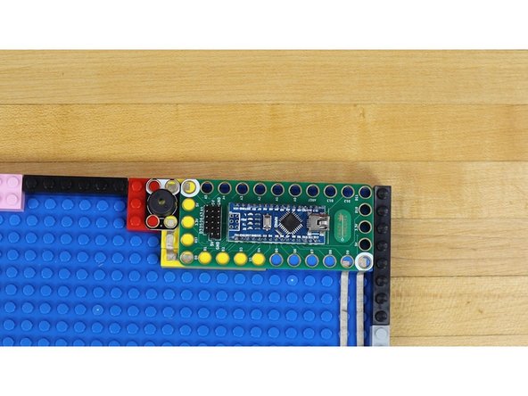 Make sure boards are firmly attached to the LEGO bricks and that Maker Tape makes a solid connection to the pins.