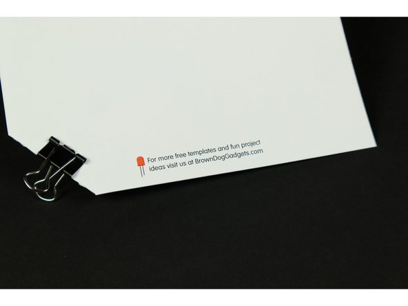 You can use a binder clip as a switch for your card. As long as it's in place holding the corner to the battery, your card will light up.