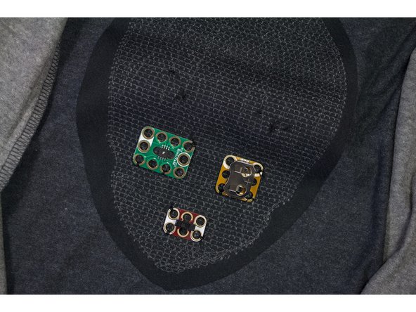 Turn the shirt inside out.