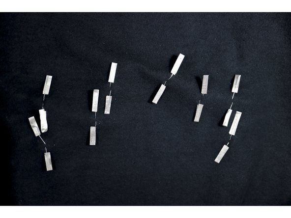 Make the LED legs easier to connect by wrapping about 1 inch of Maker Tape around each leg as shown.