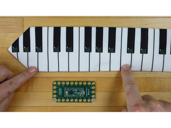 Maker Tape is our special conductive tape. It's made of nylon and conductive on top and bottom. It's more like a fabric ribbon than your traditional foil conductive tape. It's ideal for this project because it can bend, twist, and fold without breaking. Seriously, don't use copper foil for this project. (Or anything. Ever.)