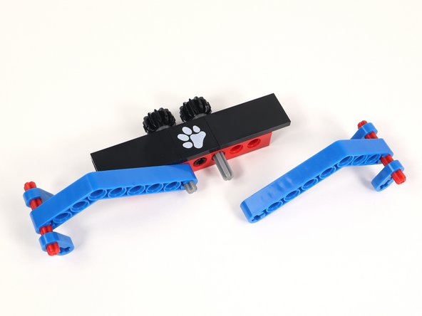 Connect the Claw arms to the axles on Section 3.