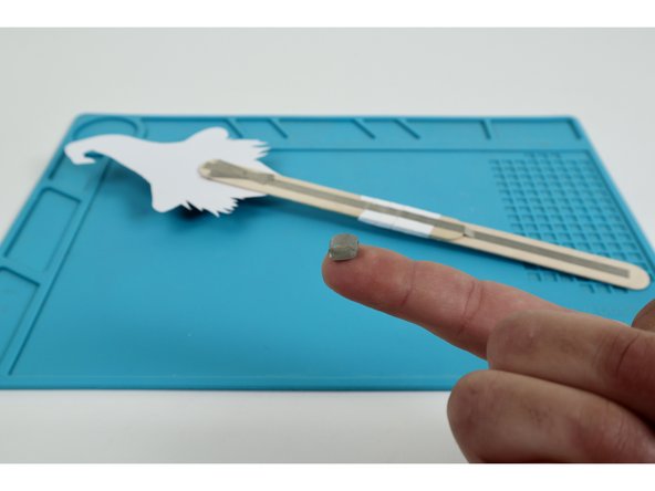 Stick that tape loop in place atop the far end of the long path from the previous step as shown.