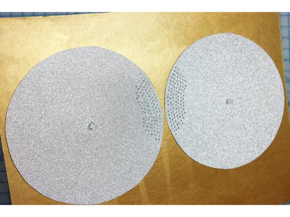 Glue the eye pieces in place, aligning the holes with the cutouts.