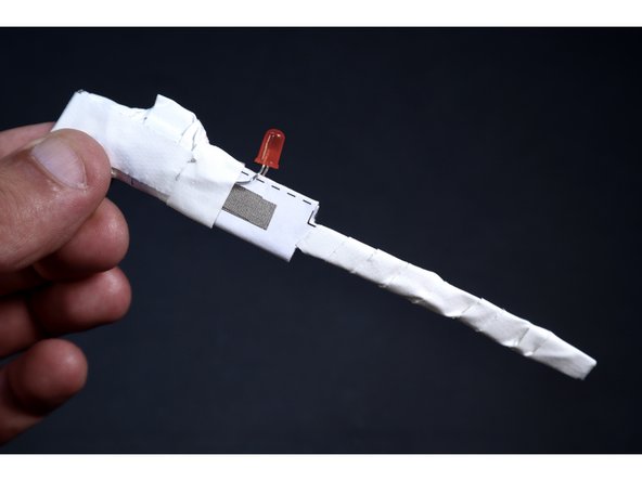 Wrap a small chunk of tape around the area where the width of the shape changes to neatly reinforce.