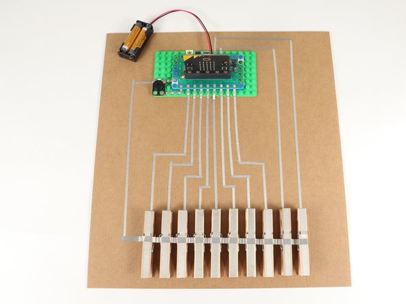 We used a piece of cardboard for our build. (Save those boxes!)