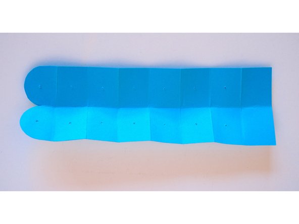 Unfold the tentacle, then refold it inside out so the template markings are on the inside