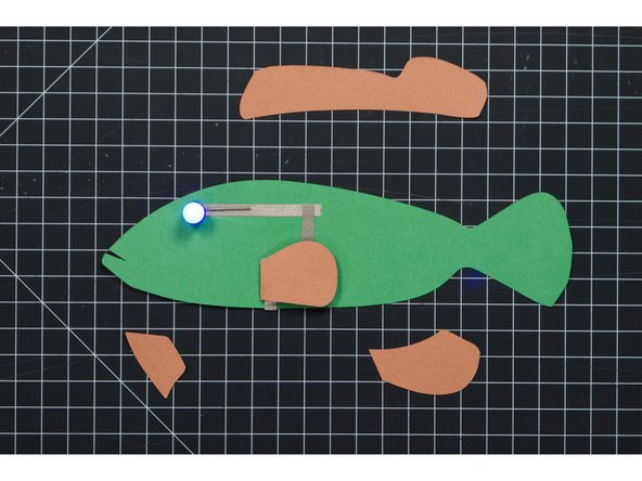 If the LED does not light up try flipping the battery upside down. If you’ve accidentally reversed the legs when you put the LED in place the polarity will be reversed, so flipping the battery might get it working!