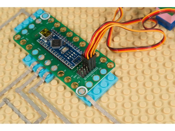 The red and brown wires are used to provide power to the servo, and the orange wire carries the &quot;signal&quot; from the Robotics Board that tells the servo what to do.