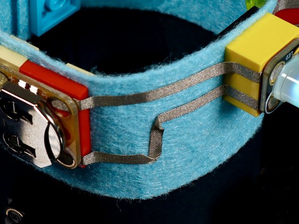 Use the tape paths portion of the circuit diagram to guide you as you measure, cut, peel and stick the needed tape paths atop your project.