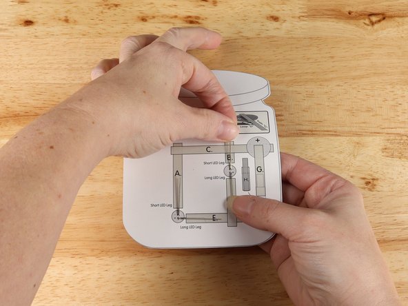 Bend the LED legs flat on the back following the diagram.