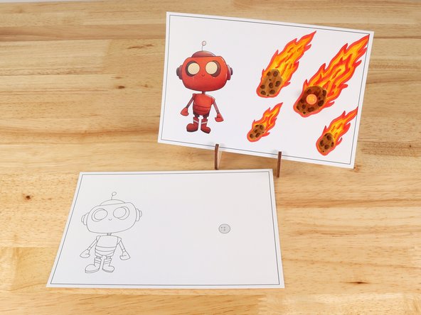 Poke holes through the front of the card for the LED legs, then push the legs through the front.