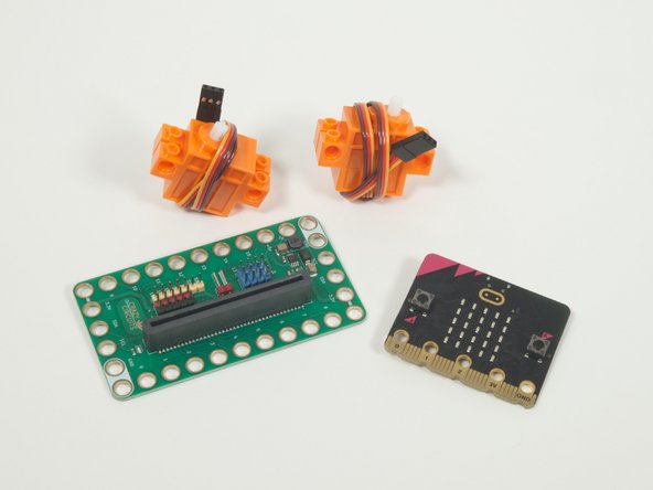 You'll also need a Bit Board and micro:bit, along with two (orange) Brick Compatible Continuous Rotation 360 Degree Servos.