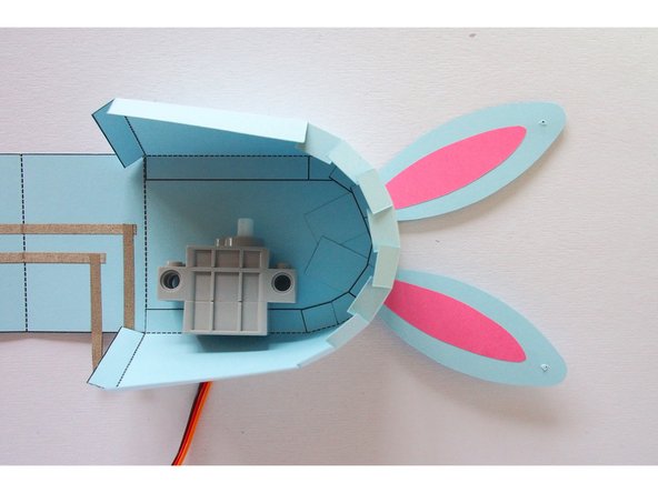 Move the servo so the back is flush with the side of the body