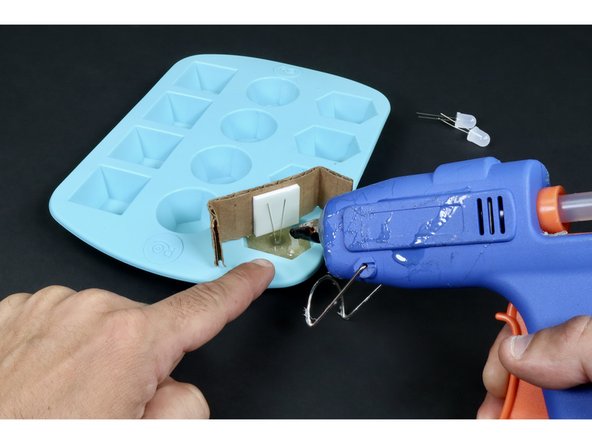 If your LED positioning got jostled around during the mold-filling, now's the time to adjust while the glue is still liquified.