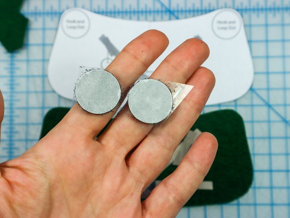 Peel the paper backing off of each hook and loop dot and place it where shown on the template.