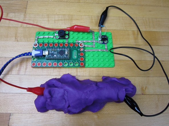 Connect the second Alligator Clip.