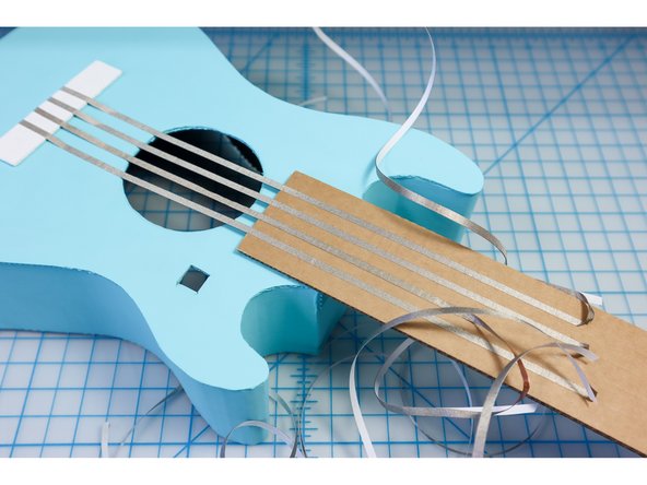 Mark the string locations on the neck using the template.