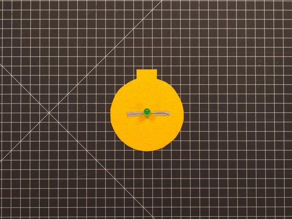 Add two Maker Tape &quot;pads&quot; spaced as shown, then place the LED on top of the pads.