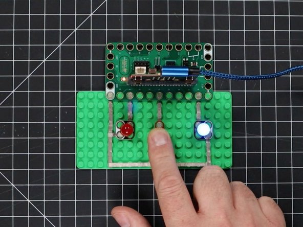 Can you add another LED and another button? Can you make two LEDs blink alternately?