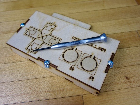 Use the three screws to assemble the wooden box.