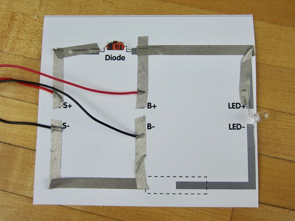 Run it across and down, covering the long, positive, leg of your LED.