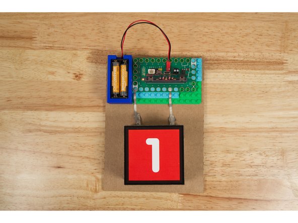 Each Team Unit will need to be programmed separately so each sends a unique value (the team number) to the Host Unit. (Besides setting one variable, the code is the same for each team unit.)