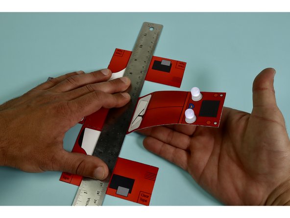 Fold the tractor so it matches the image.