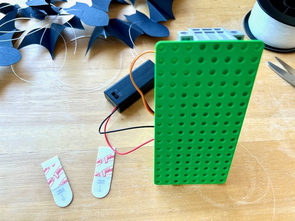 Use command strips to adhere the baseplate and the battery pack to the wall (so you don't make any permanent marks on the wall).