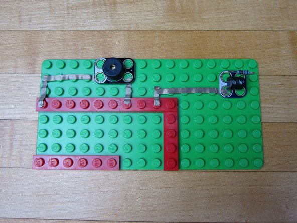 Run a line of Maker Tape from Pin 14 to the white side of the Screw terminal.