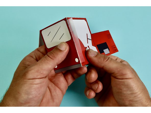 Use clear tape along the edges to keep the panels together.