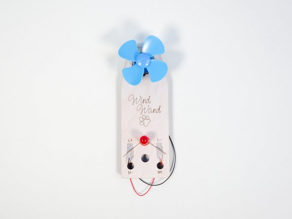 Thread the black and red wires through the holes in the Wind Wand body.